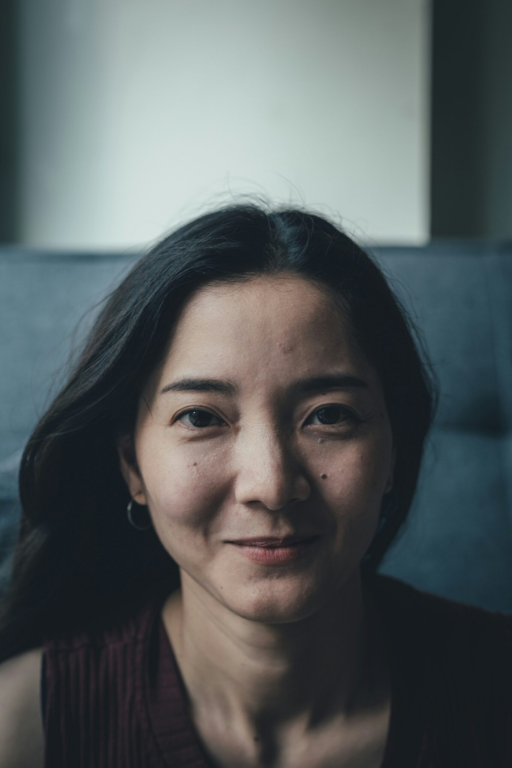 Asian woman in Raleigh North Carolina receiving counseling